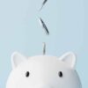 Silver coins fall into a piggy bank.