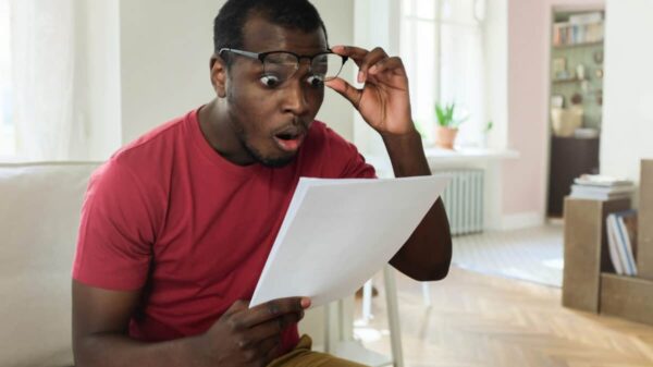 man looks surprised at investment growth