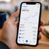 Coinbase crypto app showing Bitcoin and Ethereum prices on a smartphone