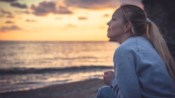woman looks out at horizon